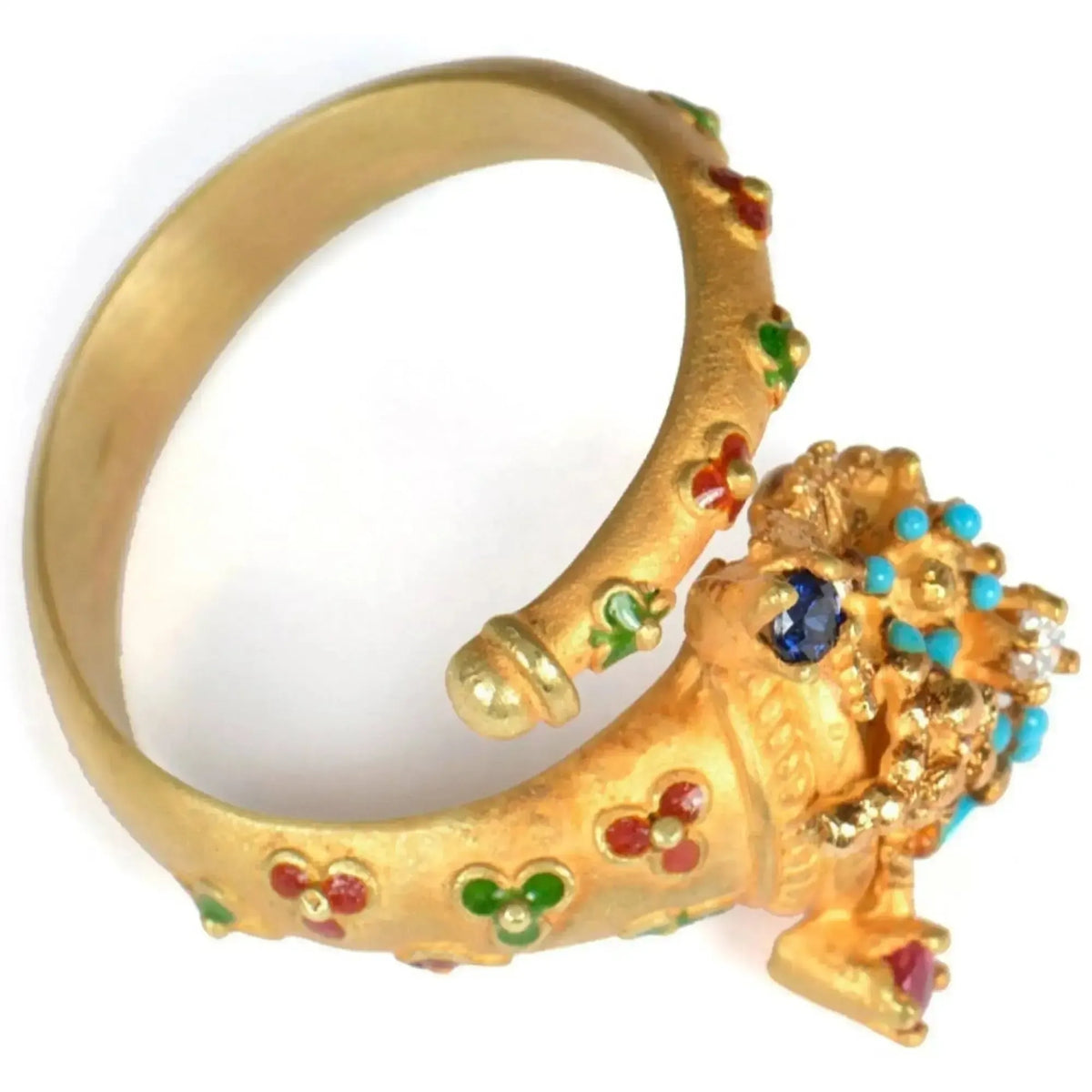 18KT gold cornucopia ring with stones