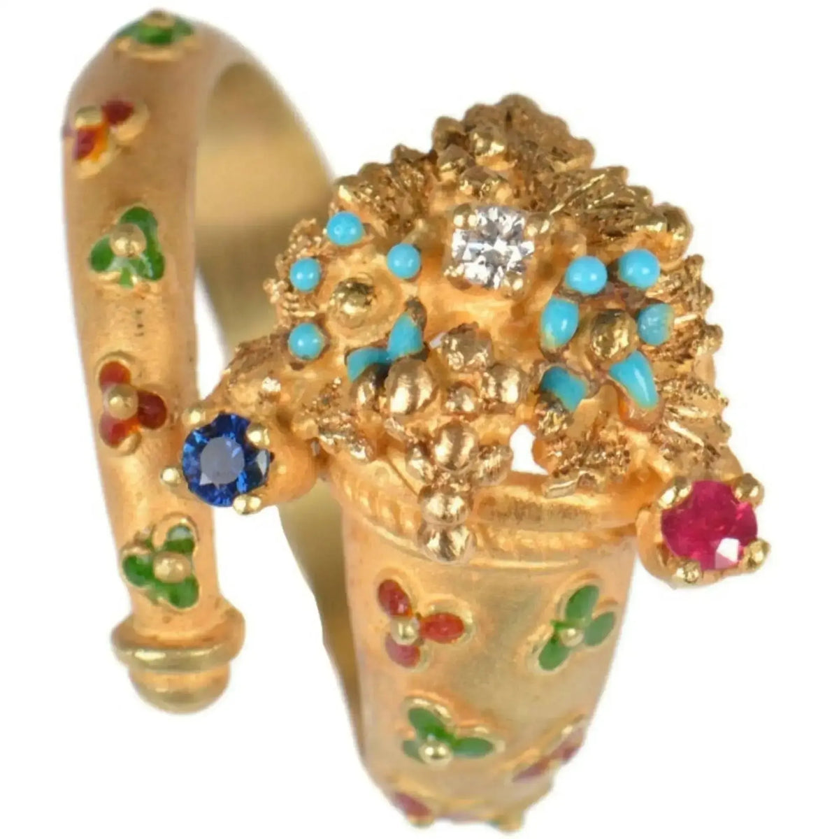 18KT gold cornucopia ring with diamond.