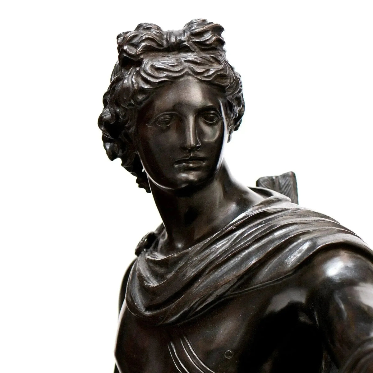 Bronze statue of Apollo Belvedere from the Vatican museums. Close-up on the face.