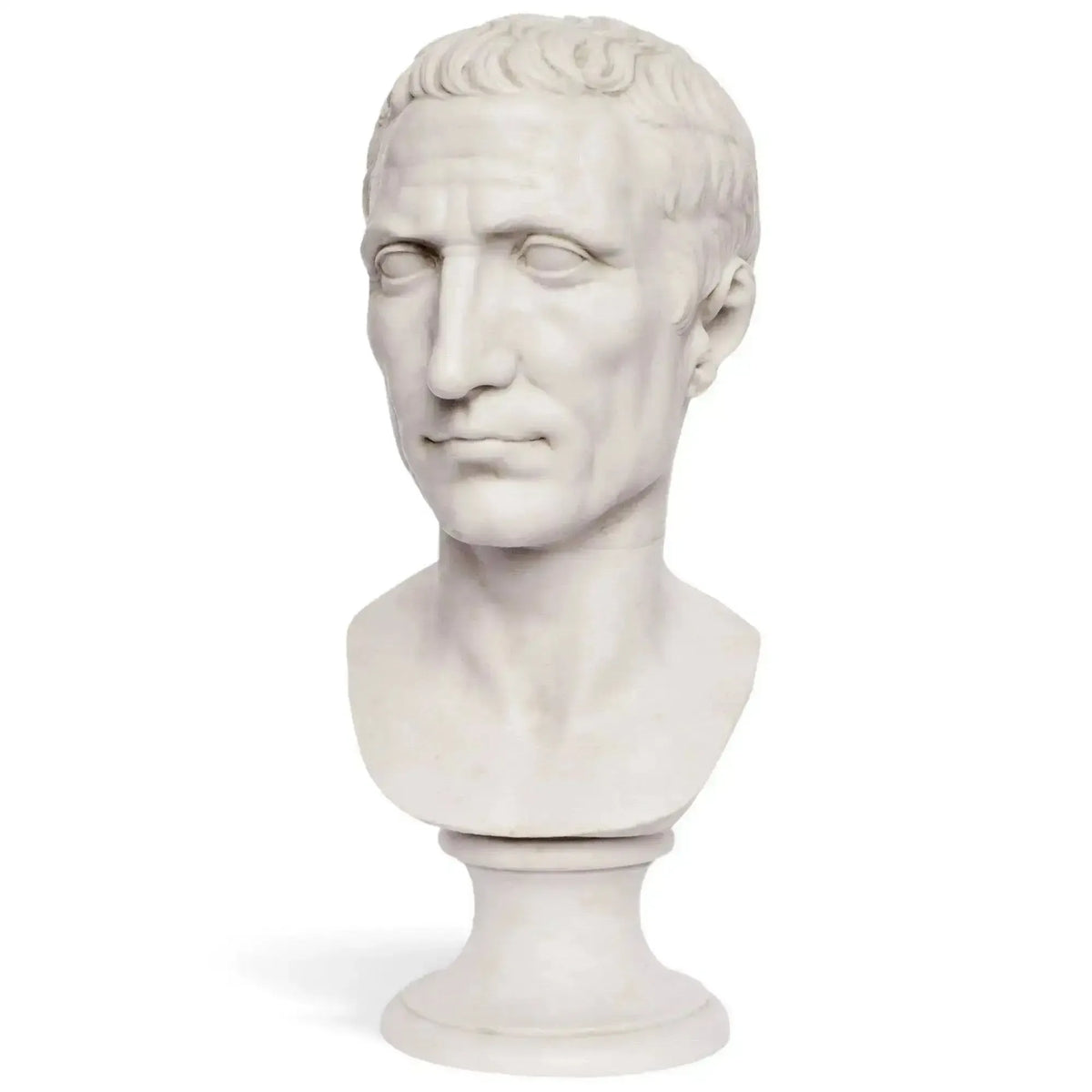 Replica of the bust of Julius Caesar in white Carrara marble, which highlights the details of the face.