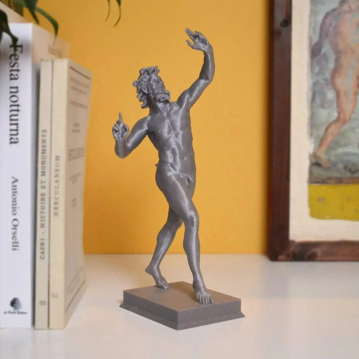 Estatua tridimensional del fauno danzante de Pompeya.
