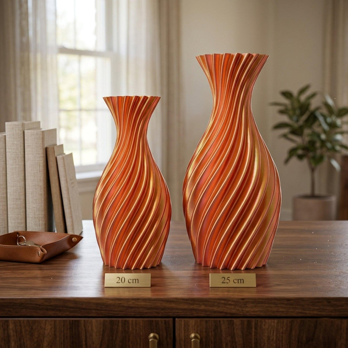 Two pink/orange vases with size comparison 20 and 25 cm