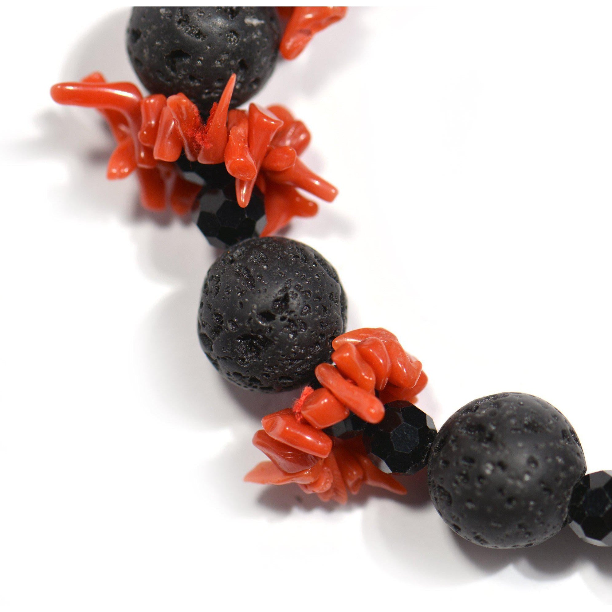 Bracelet with red coral, lava stone and onyx